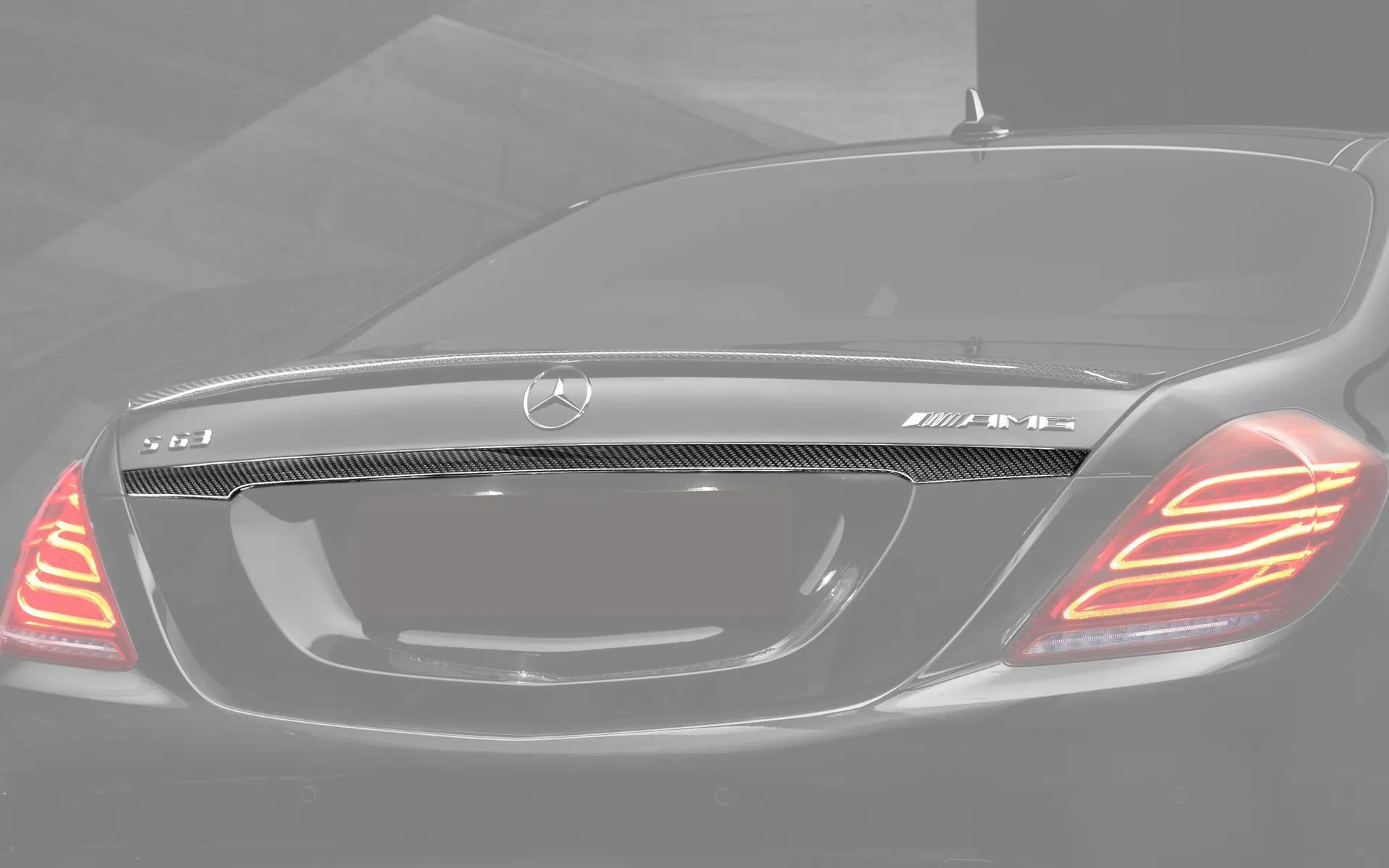 Carbon fiber trim on the trunk above number 63 AMG for Mercedes S-class W222