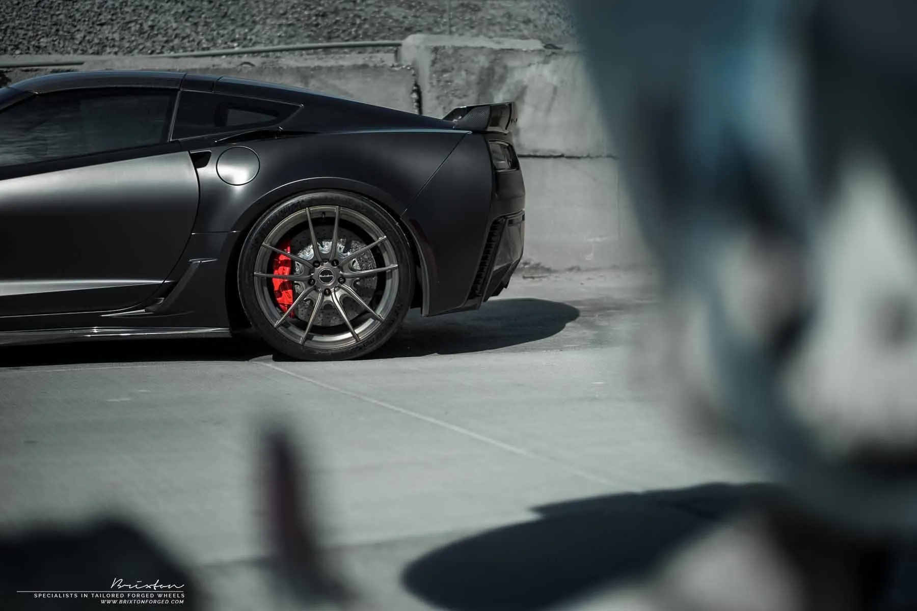 images-products-1-2282-232974570-black-corvette-c7-z06-forged-wheels-brixton-forged-m53-ultrasport-1-piece-brushed-smoke-black-ma.jpg