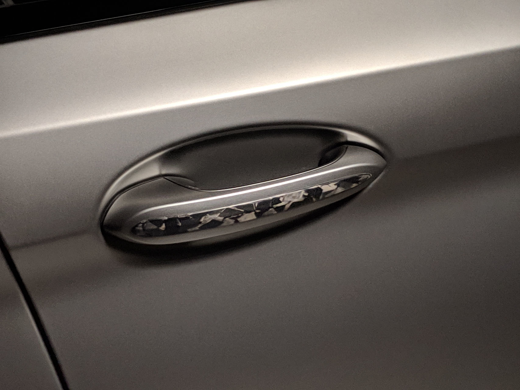 Carbon inserts in door handles BMW X5 G05