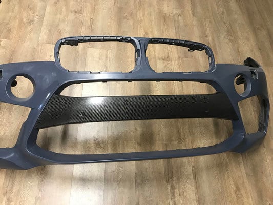 Hodoor Performance Carbon fiber pad on the central part of the front bumper for the BMW X6M F86
