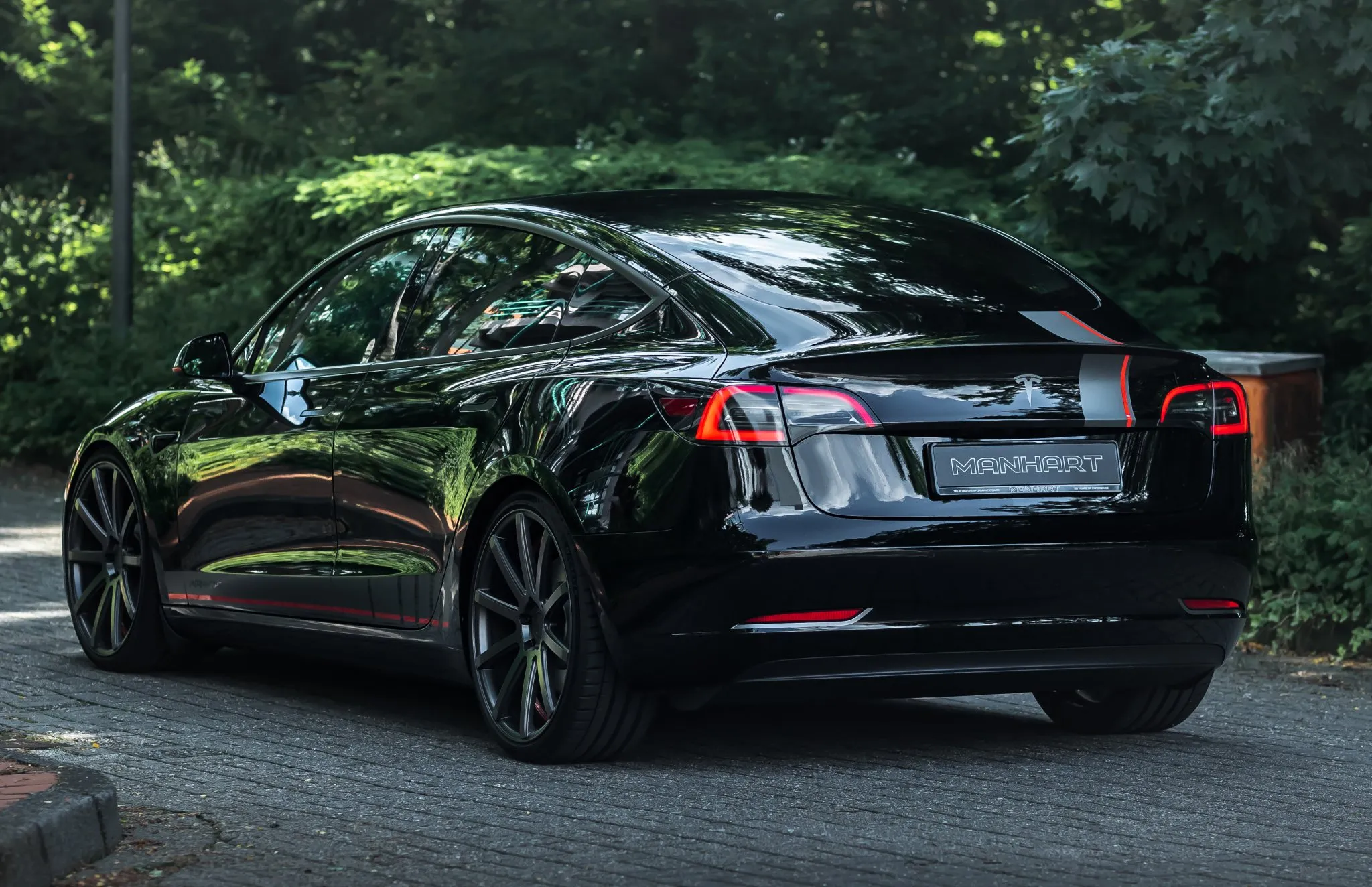 Check our price and buy an Manhart carbon fiber body kit for Tesla 3!
