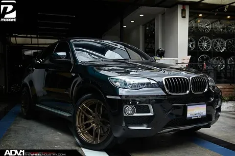 BMW X6 on ADV.1 ADV005 M.V2 CS Series bronze matte 20-inch SUV wheels — 3/4 view