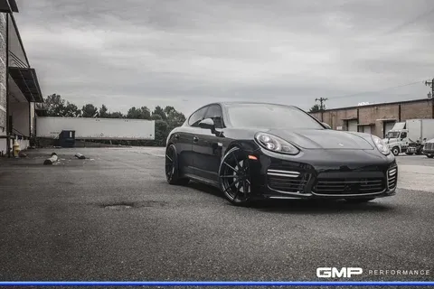ADV.1 ADV10 M.V2 SL on Black Porsche Panamera Turbo — red brakes