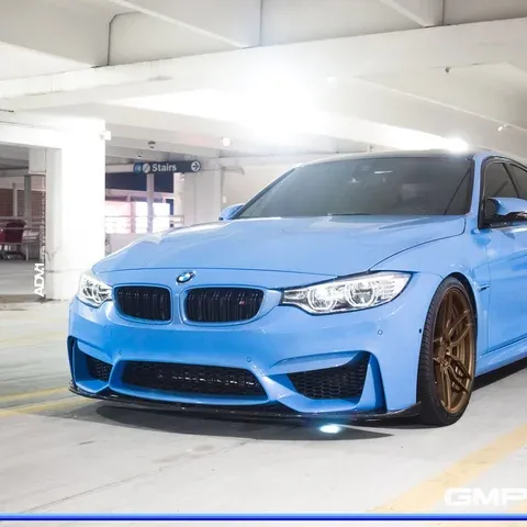 BMW M3 Yas Marina Blue on ADV.1 ADV005 M.V2 CS Series bronze forged wheels — 3/4 view
